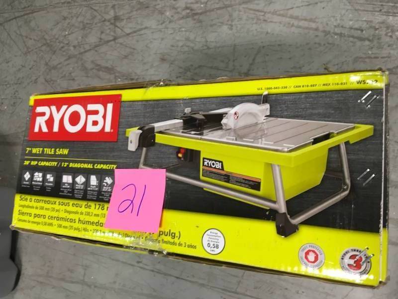 lot 21 image: Ryobi 7 in Tile saw used in like new condition