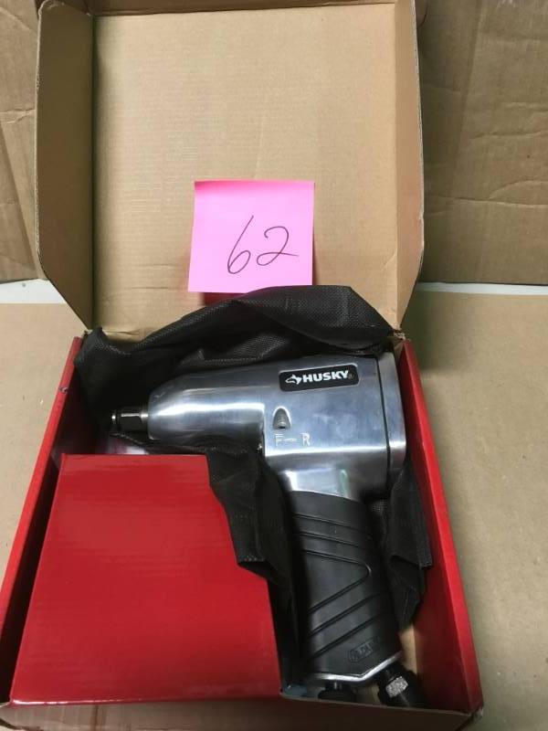 lot 62 image: Husky 12 in. 300 ft. lbs. Impact Wrench not used
