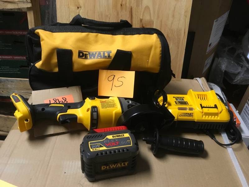 DEWALT FLEXVOLT 60-Volt MAX Lithium-Ion Cordless Brushless 4-12 in. Angle Grinder with Battery 2Ah, Charger and Contractor Bag in like new condition