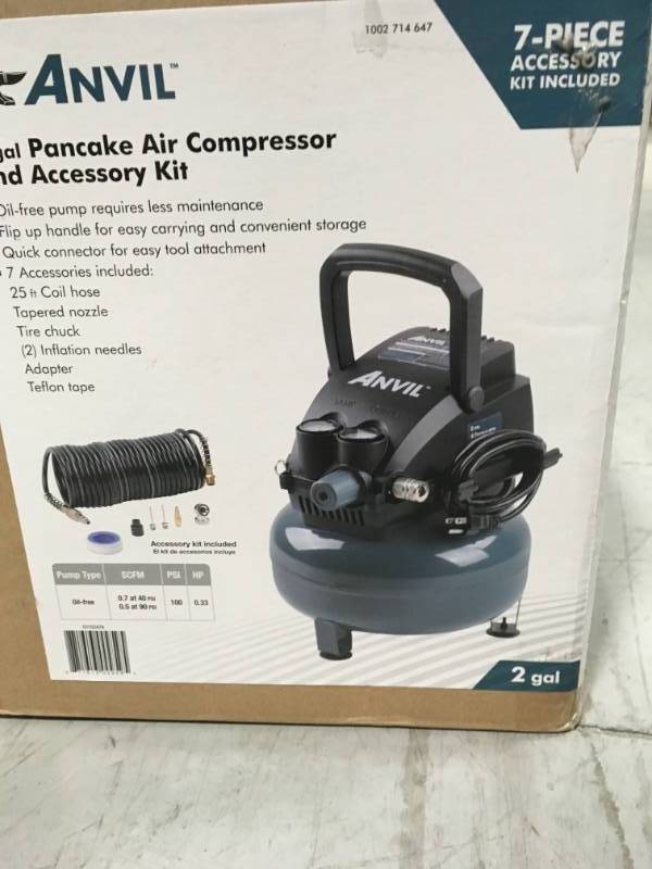 lot 29 image: ANVIL 2G Pancake Air Compressor with 7-Piece Accessories Kit not used