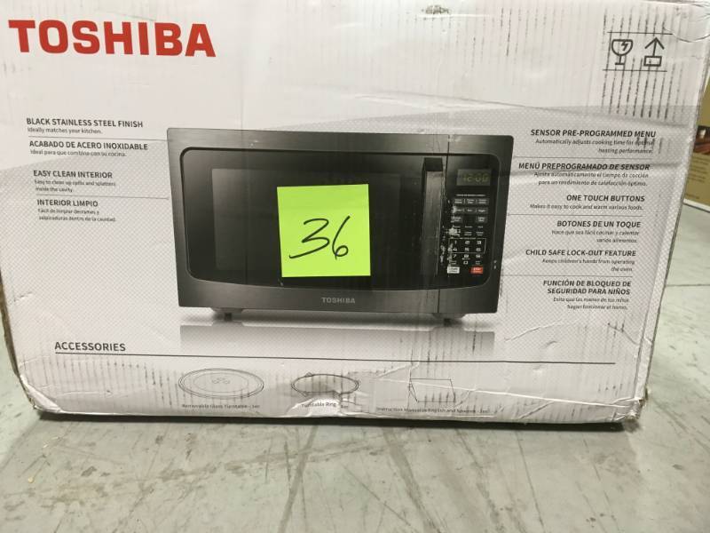 lot 36 image: Toshiba 1.2 Cu. Ft. Microwave Oven in Black Stainless Steel not used
