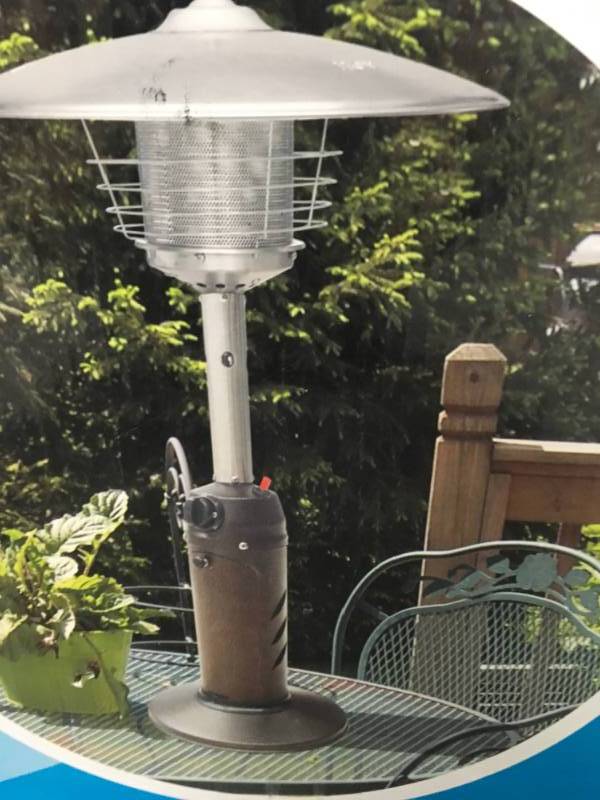 lot 51 image: Hampton Bay 11,000 BTU Powder Coated Bronze Tabletop Propane Patio Heater  in like new condition