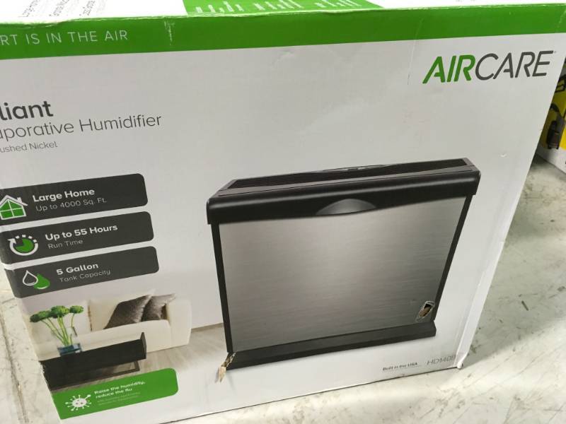 lot 64 image: AIRCARE 5 Gal. Evaporative Humidifier for 4,000 sq. ft. in like new condition
