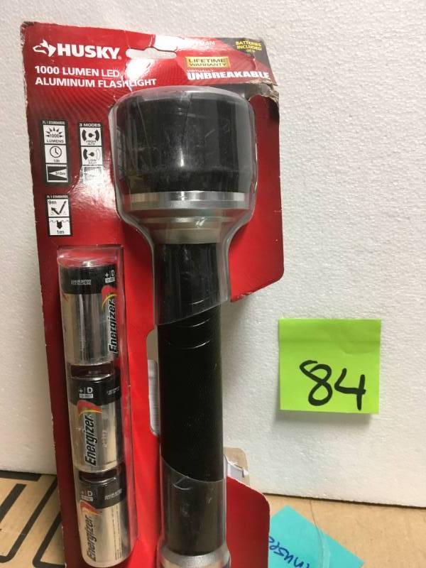lot 84 image: Husky 1000 Lumen Virtually Unbreakable Aluminum Flashlight not used