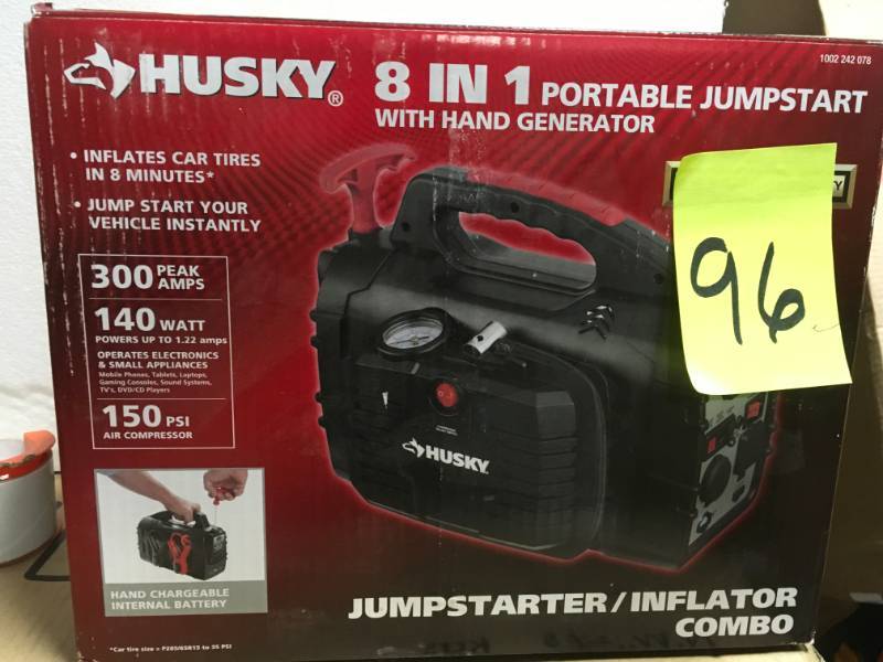 lot 96 image: Husky 8-in-1 12-Volt Power SourceJumpstarter  in like new condition