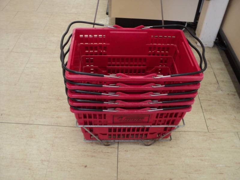 Lot of shopping baskets in a stand