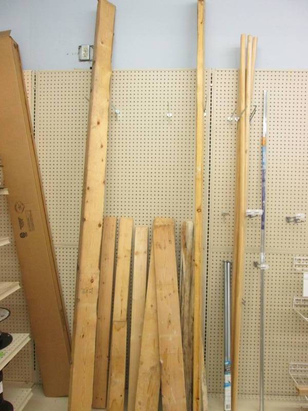 Lot of lumber and 4 closet rods, 1 ...