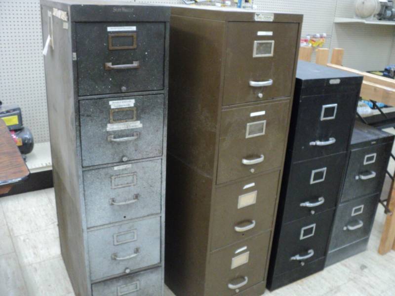 4 Filing Cabinets...