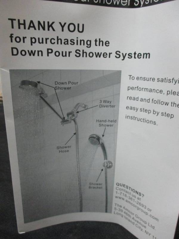 lot 58 image: Down Pour Shower System Still unopened in box