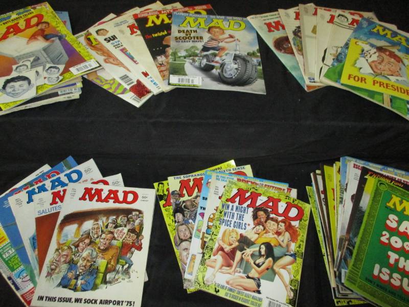 lot 100 image: Over 50 MADD Magazines 1970-2000
