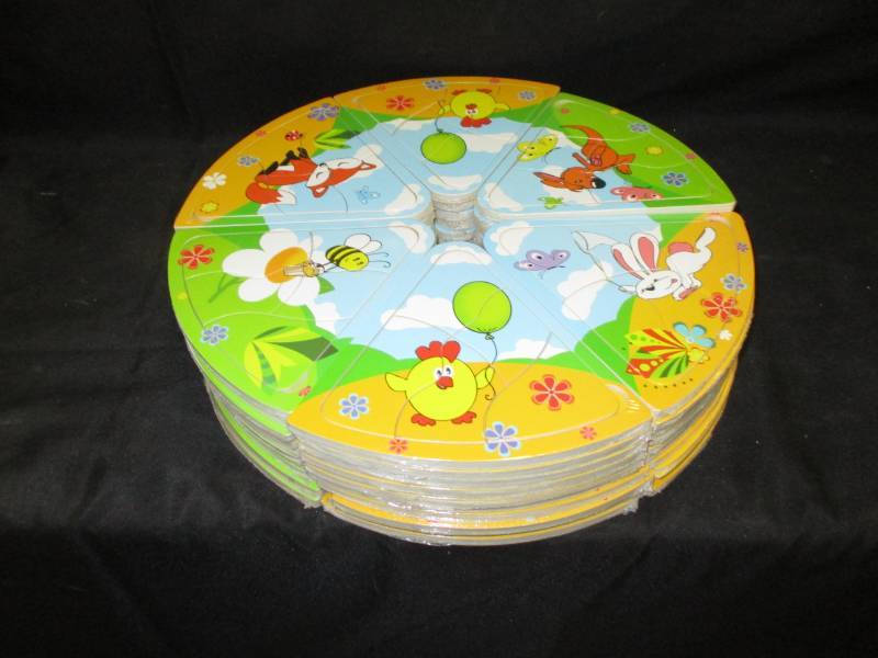 lot 217 image: 60 Mini Puzzles will make great stocking stuffers or use for a game Unopened and sealed in plastic so you could sell them
