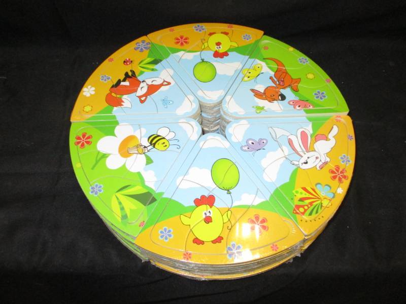 lot 219 image: 60 Mini Puzzles will make great stocking stuffers or use for a game Unopened and sealed in plastic so you could sell them