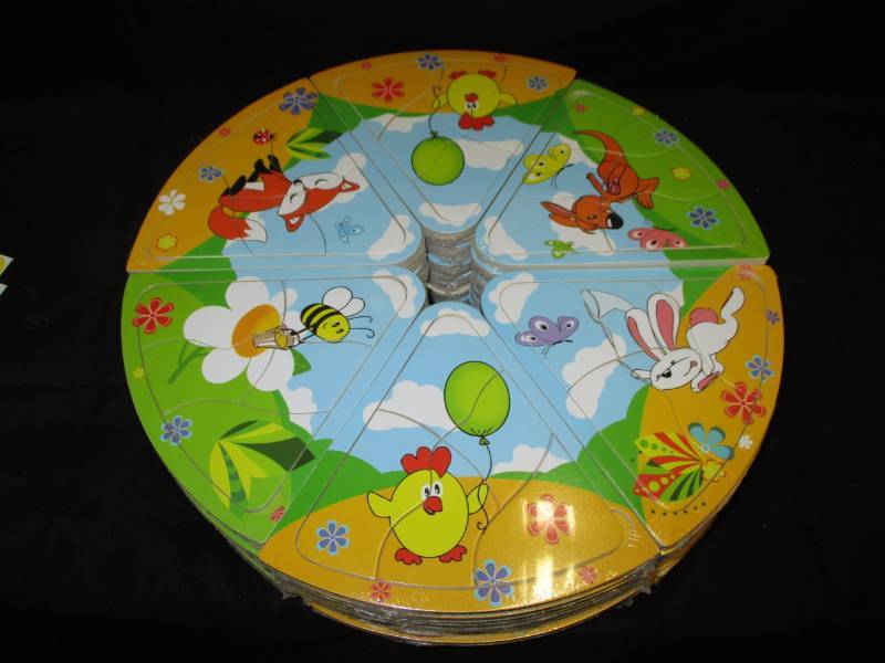 lot 221 image: 60 Mini Puzzles will make great stocking stuffers or use for a game Unopened and sealed in plastic so you could sell them