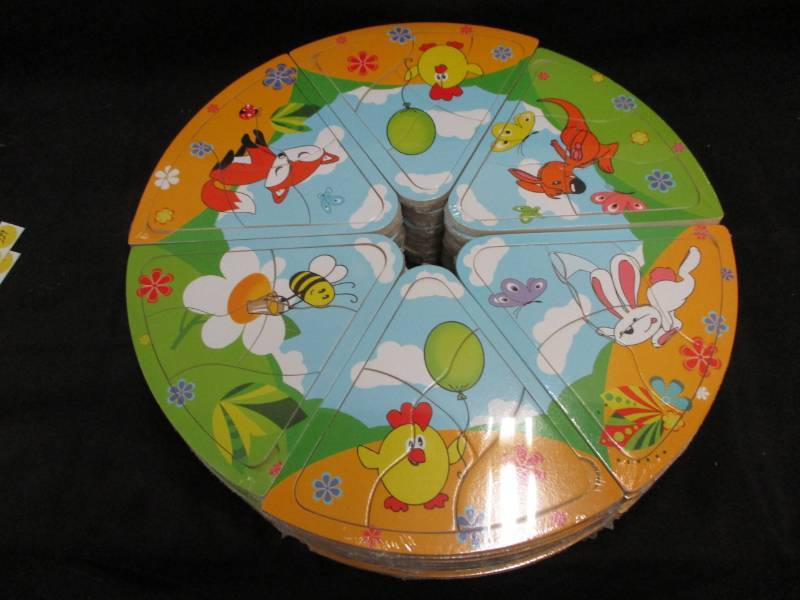 lot 225 image: 60 Mini Puzzles will make great stocking stuffers or use for a game Unopened and sealed in plastic so you could sell them