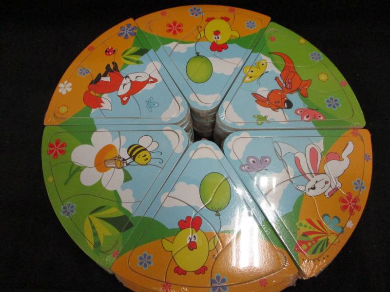 lot 229 image: 60 Mini Puzzles will make great stocking stuffers or use for a game Unopened and sealed in plastic so you could sell them