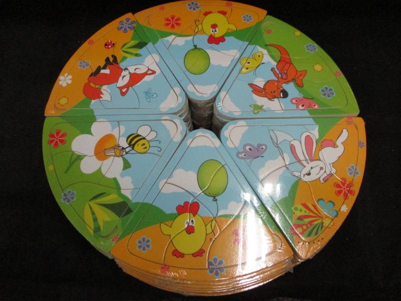 lot 230 image: 60 Mini Puzzles will make great stocking stuffers or use for a game Unopened and sealed in plastic so you could sell them