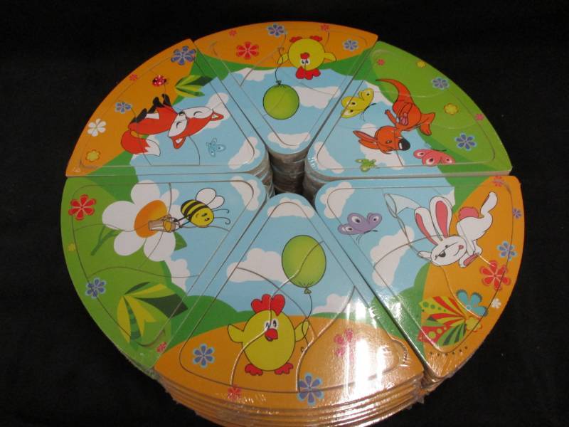 lot 232 image: 60 Mini Puzzles will make great stocking stuffers or use for a game Unopened and sealed in plastic so you could sell them