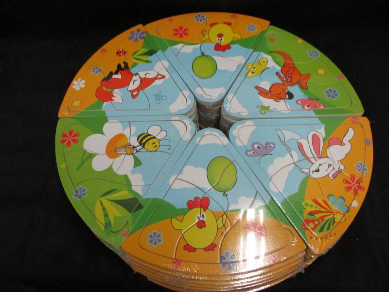 lot 234 image: 60 Mini Puzzles will make great stocking stuffers or use for a game Unopened and sealed in plastic so you could sell them
