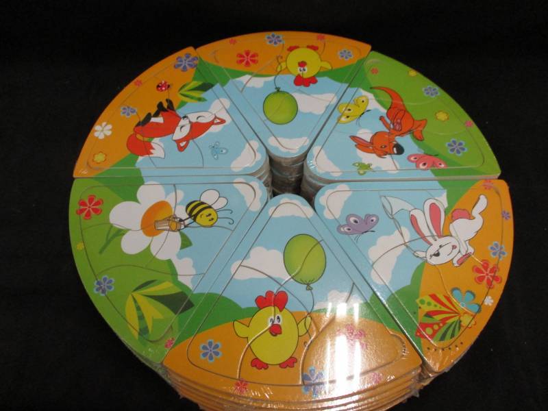 lot 235 image: 60 Mini Puzzles will make great stocking stuffers or use for a game Unopened and sealed in plastic so you could sell them