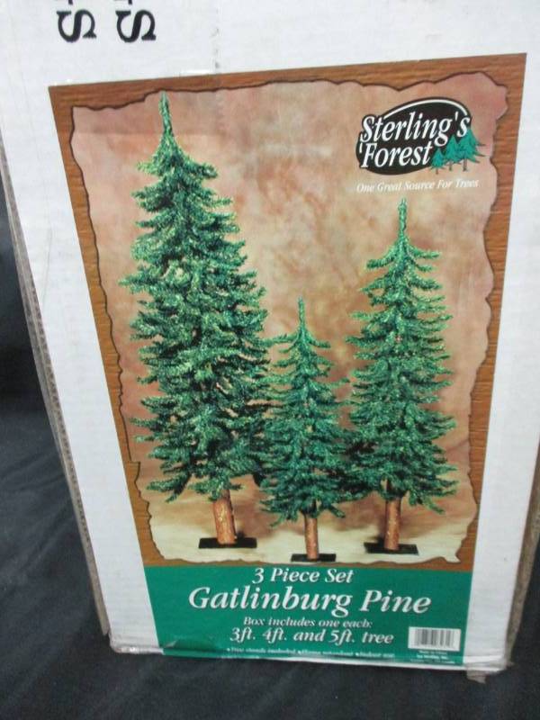 lot 242 image: 3 Piece Set Pine Trees unopened in Box 3 ft, 4 ft and 5 ft