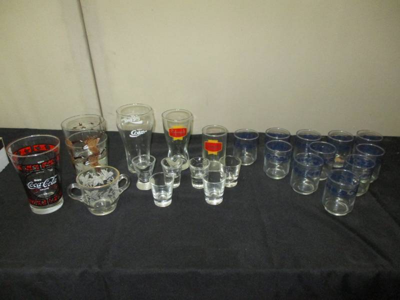 lot 263 image: Schmidt, beer Coke and various glasses some shot glasses