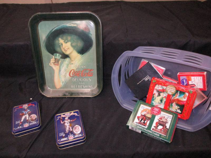 lot 283 image: Coca Cola metal serving tray, and Commerative Playing cards Wtins