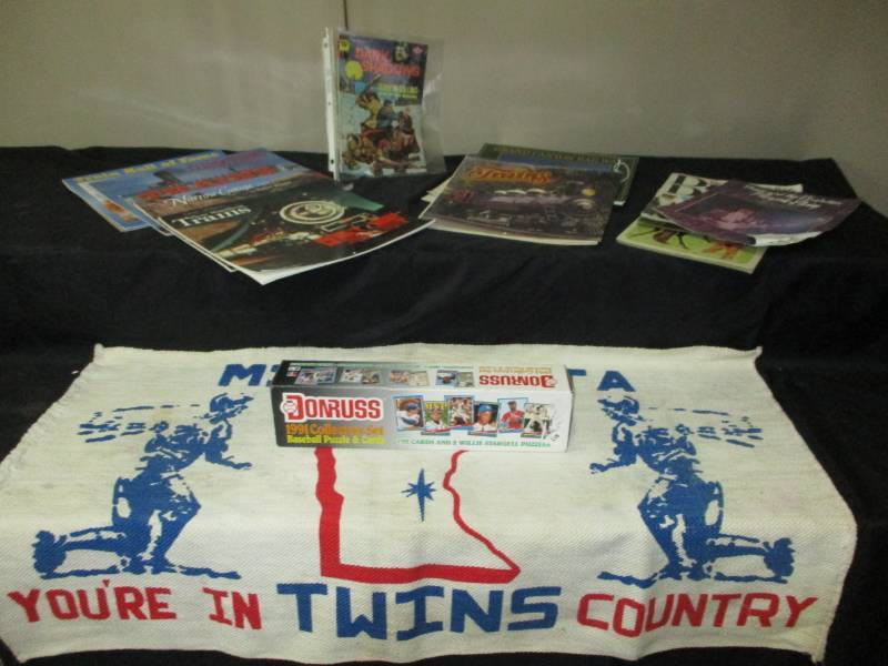 lot 314 image: Baseball Cards, Ohio State Rug, Three Little Kittens record, Puizzle Comic Book, Prince Music, old calendarsa dn more