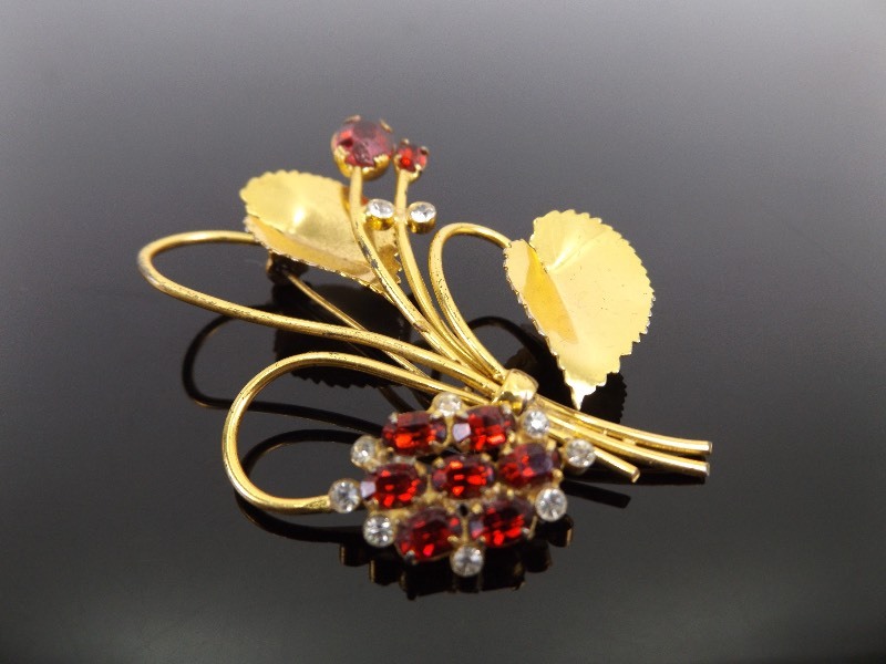 lot 76 image: .925 Sterling Silver Ruby Red Rhinestone Gold Wash Flower Brooch
