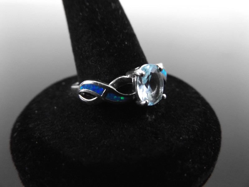lot 92 image: .925 Sterling Silver Faceted Blue Topaz and Australian Opal Ring&nbspSz 10