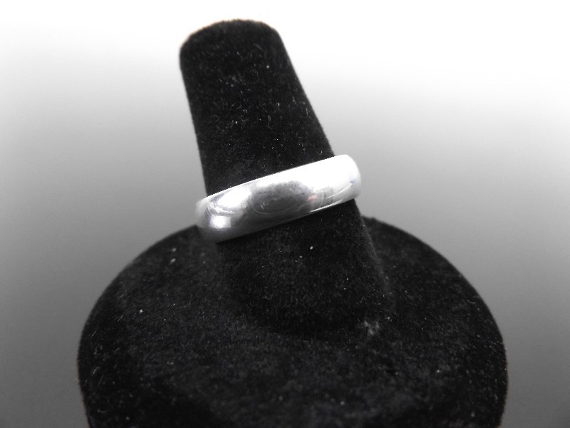lot 101 image: .925 Sterling Silver Comfort Fit Band Ring Sz 6.75