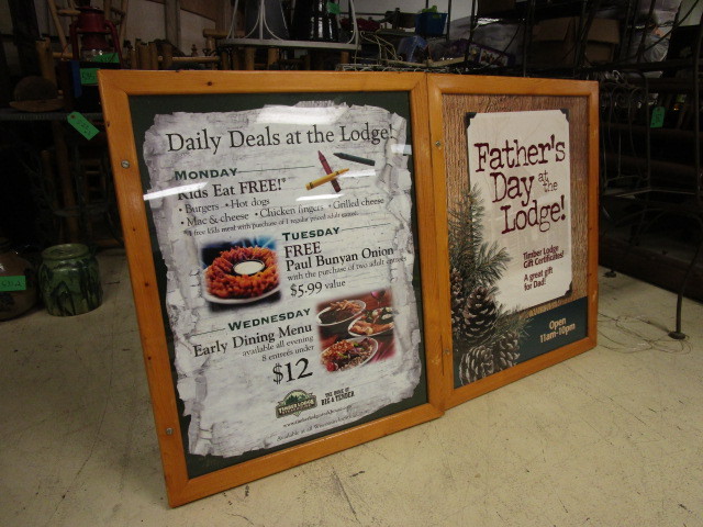 lot 543 image: TWO WOODEN ADVERTISING DISPLAY FRAMES