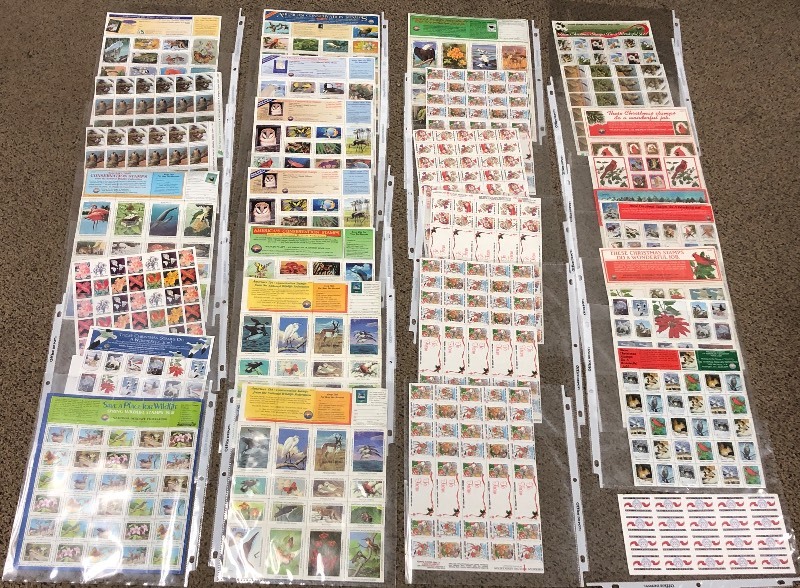 (28) Sheets Of Christmas Stamps