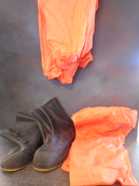 Orange Hunting Pants and Rubber Boots