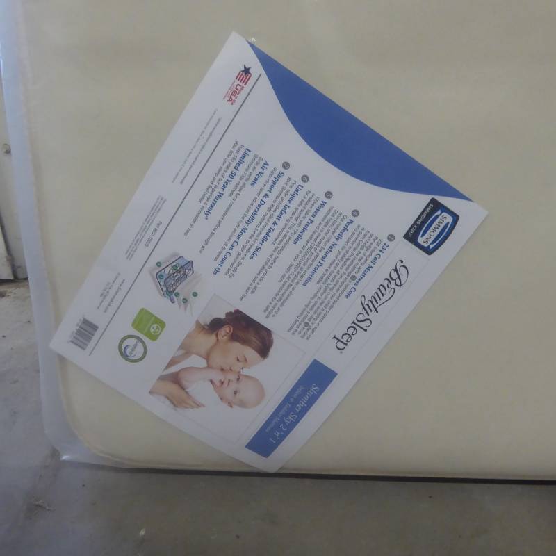 lot 1 image: Brand New BeautySleep Slumber Sky Coil Crib Mattress