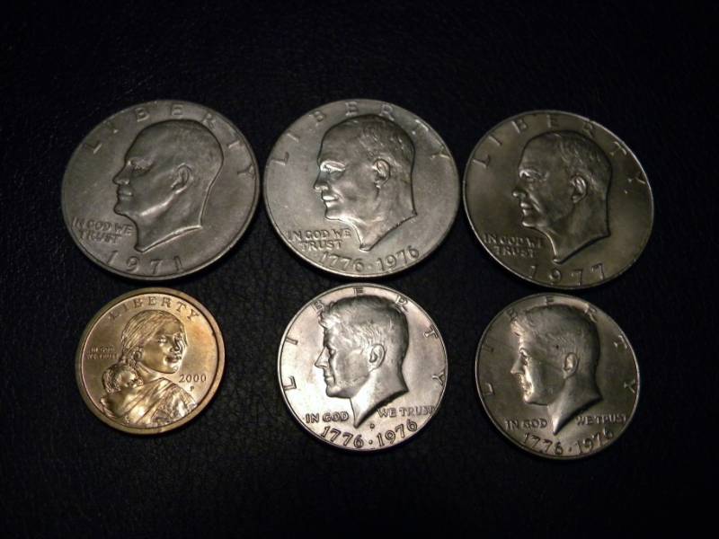3 Eisenhower and 1 Sacagawea Dollars & 2 Kennedy Half Dollars