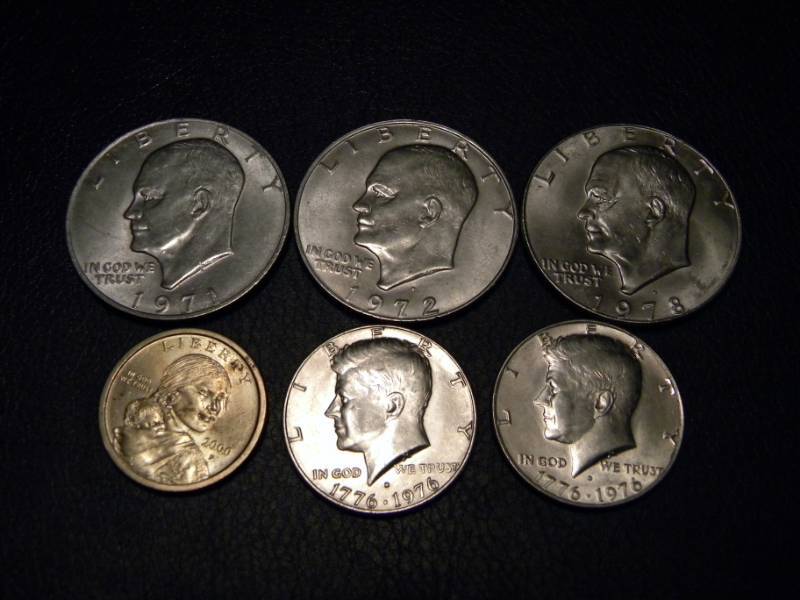3 Eisenhower and 1 Sacagawea Dollars & 2 Kennedy Half Dollars