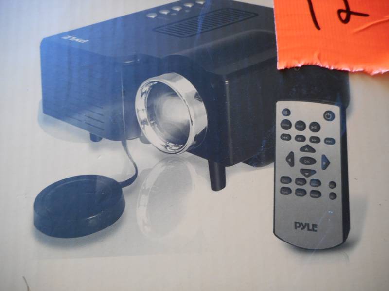 lot 12 image: Pyle Mini Compact Pocket Projector