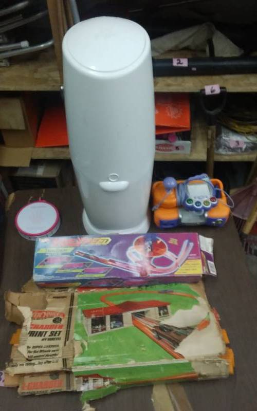 lot 50 image: V-Tech TV Game, HotWheels & Other Car Tracks, Diaper Genie