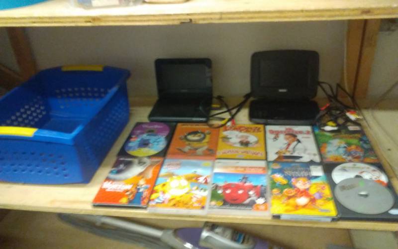 lot 58 image: 2-Portable DVD Players & DVDs