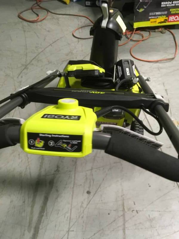 lot 50 image: Ryobi 20 in. 40-Volt Brushless Cordless Electric Snow Blower with 5.0 Ah Battery and Charger Included open box in like new condition