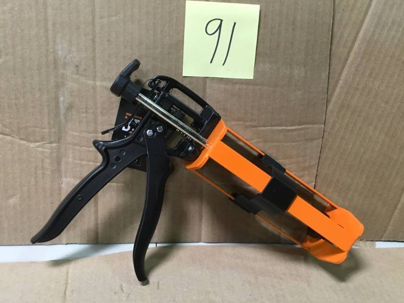 lot 91 image: JES Innovations 261 High Thrust Dual Component Cartridge Gun open box in like new condition