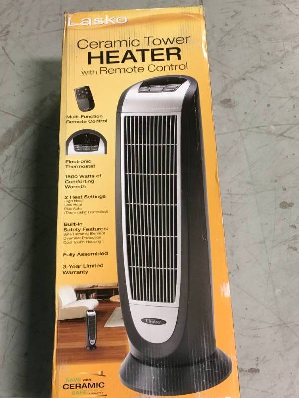 lot 35 image: Lasko 23 in. 1,500-Watt Digital Ceramic Tower Heater open box in new condition