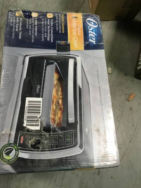 lot 48 image: Oster Black Toaster Oven open box in new condition