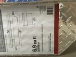 lot 105 image: Husky 62 in. Aluminum Polished Mid Sized Low Profile Truck Box NOT USED
