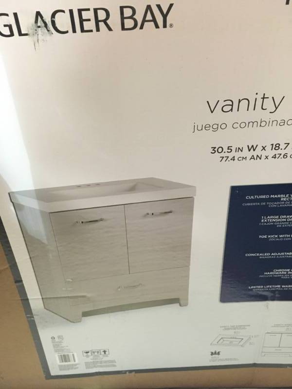 lot 16 image: Glacier Bay Stancliff 31 in. W x 19 in. D Bathroom Vanity in Elm Sky with Cultured Marble Vanity Top in White with White Basin open box in new condition