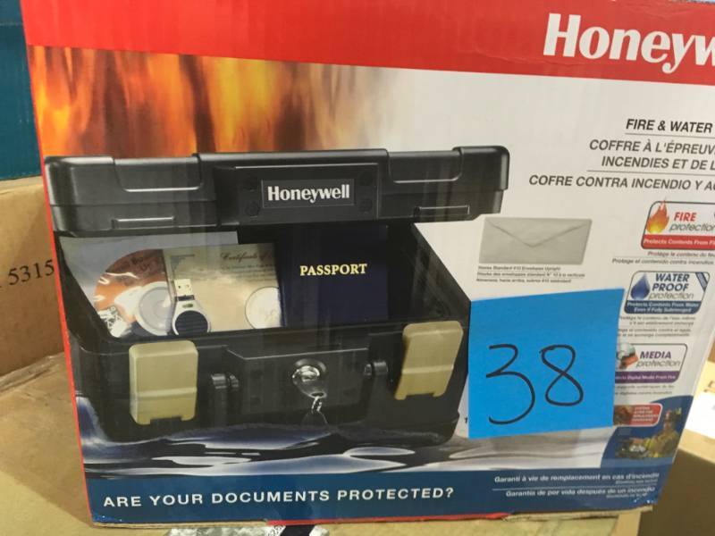 lot 38 image: Honeywell 0.15 cu. ft. Molded FireWater Chest with Key and Latch Lock open box in new condition