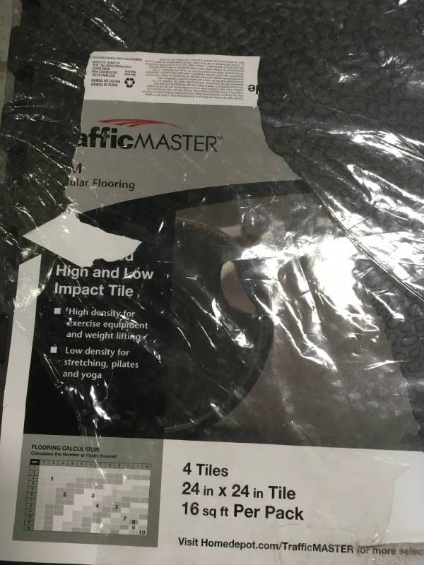 lot 59 image: TrafficMASTER BlackGray 24 in. x 24 in. x 0.52 in. High and Low Impact Gym Floor (4-Pack) not used