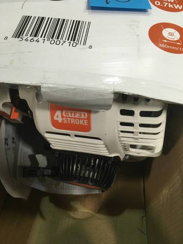 lot 76 image: Sunseeker GTF31 31cc 4 Stroke Grass Trimmer open box in new condition