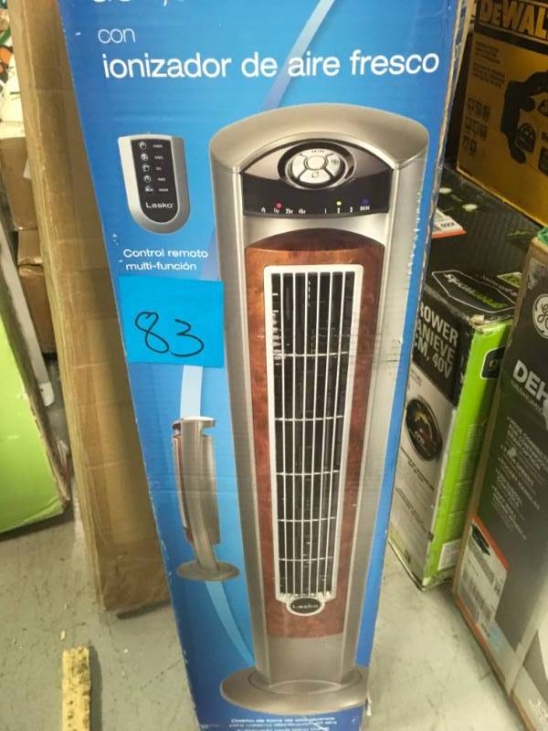 lot 83 image: Lasko Wind Curve 42 in. Oscillating Tower Fan with Fresh Air Ionizer open box in new condition