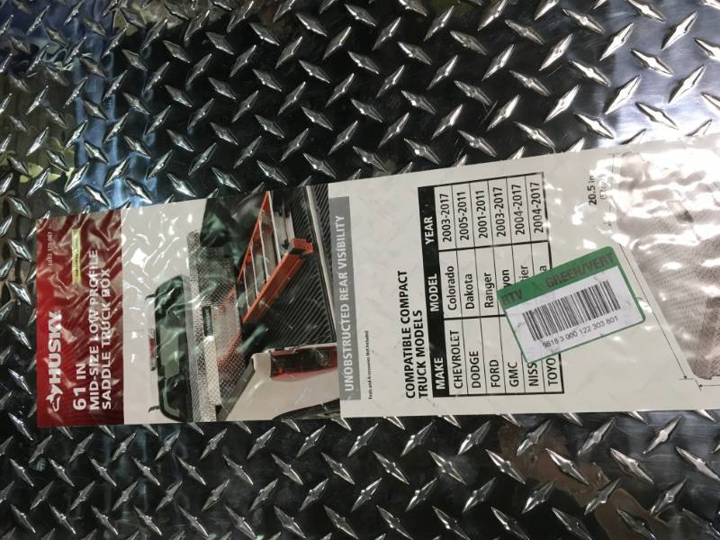 lot 97 image: Husky 61.8 in. x 20.5 in. x 15.7 in. Aluminum Compact Low Profile Saddle Truck Box not used